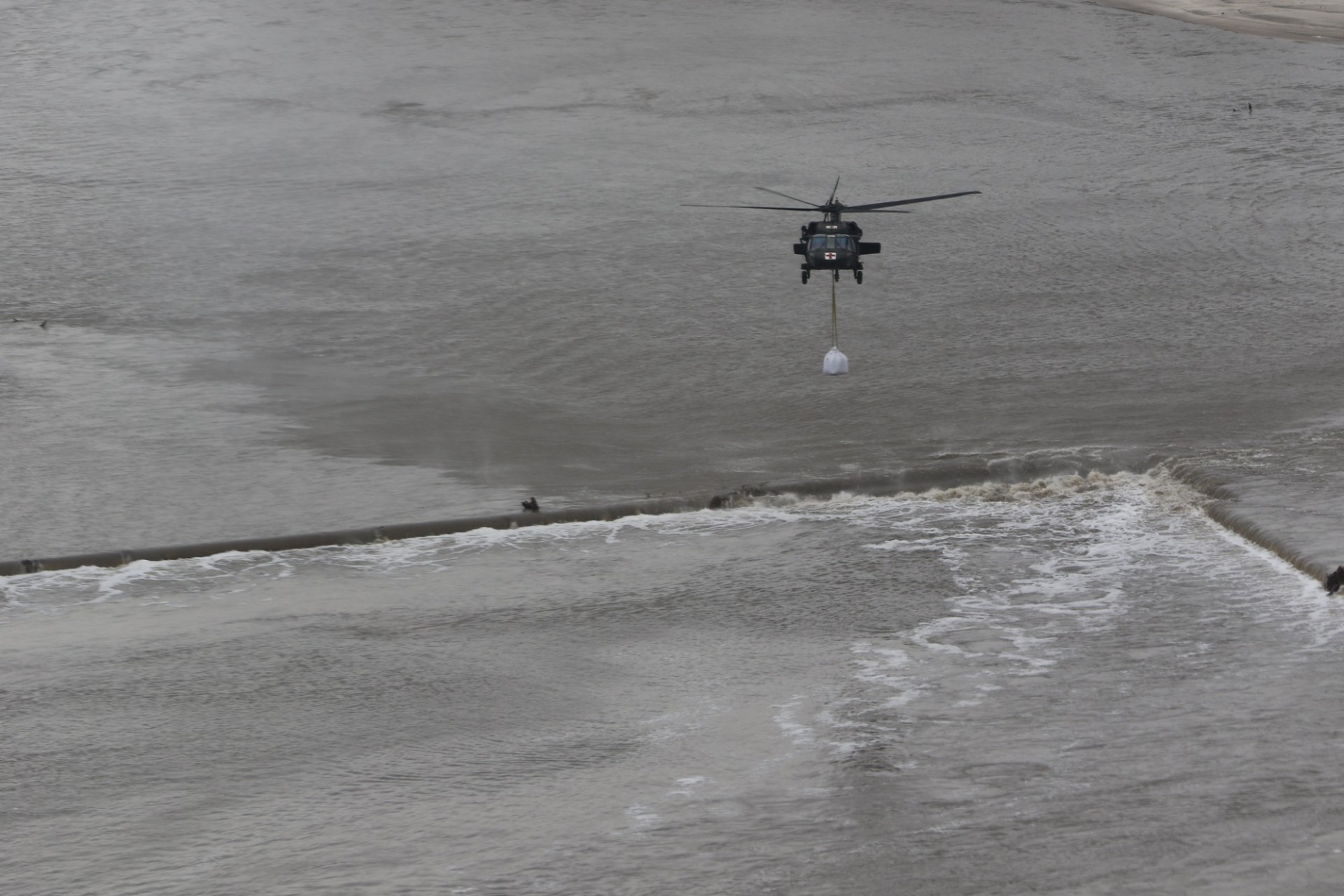 A helicopter flies over a flooded area in Nebraska 